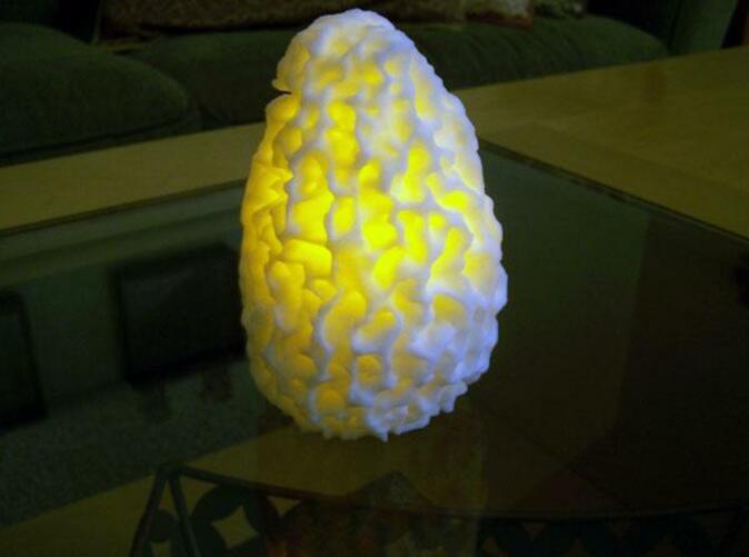 Morel mushroom lit with flickering LED candle.