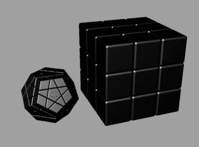 MiniMinx next to a normal 3x3