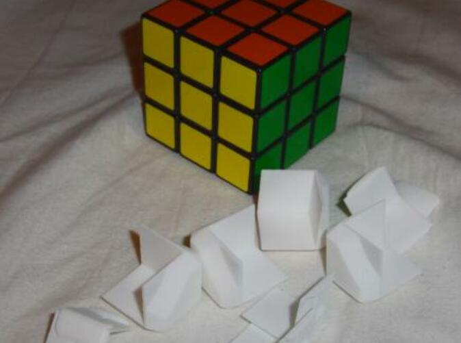 Here's the White Strong & Flexible parts, next to the Offical 3x3 Rubik's Cube.