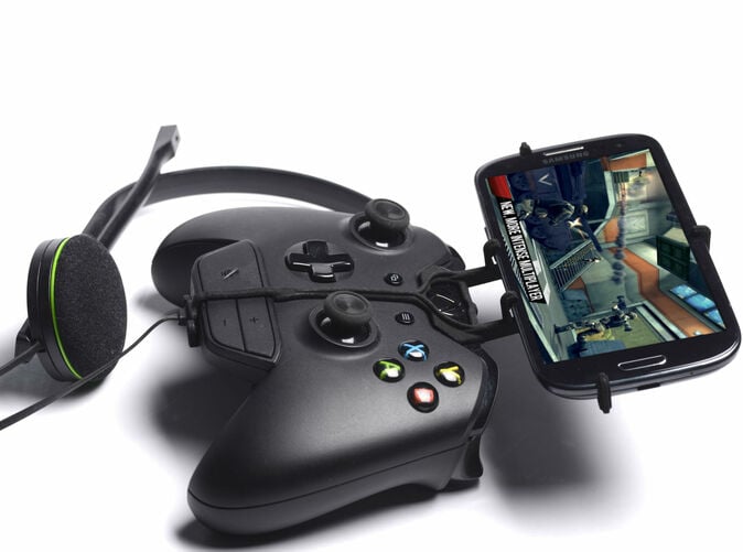 Side View - A Samsung Galaxy S3 and a black Xbox One controller & chat