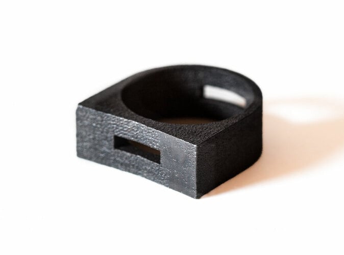 The Blackmetal ring 3D printed in Matte Black Steel.
