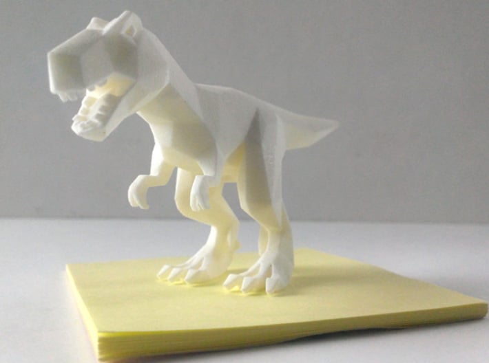 DinoWalkSim - Tyrannosaurus Rex 3d printed Sitting on a sticky note for scale
