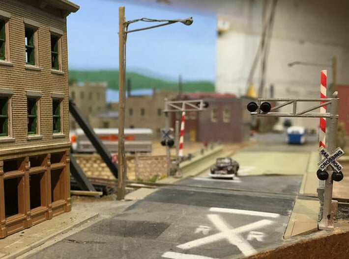 N Scale Crossing Gates 1 Lane 2x2 3d printed Crossing set (painted of course) in a great scene by Ender. The gate arm in the front set was replaced after breaking, they are fragile. Thanks for the picture Ender!