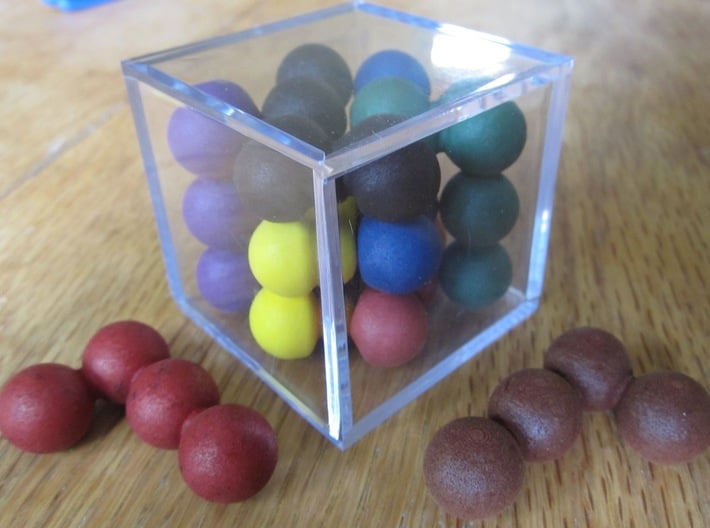 Ell of a puzzle (spheres) 3d printed The box looks full, but two more pieces can be added!