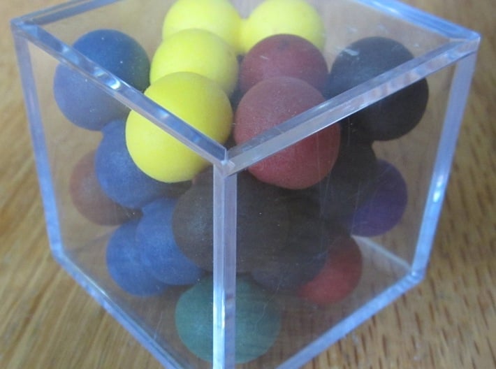 Ell of a puzzle (spheres) 3d printed Solved puzzle in golf ball case.