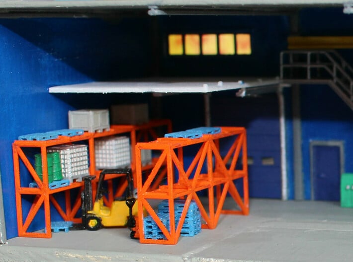 N Scale Warehouse Rack 3d printed Painted warehouse rack in a building with various of my logistics related items. Forklift by Wuttermelon