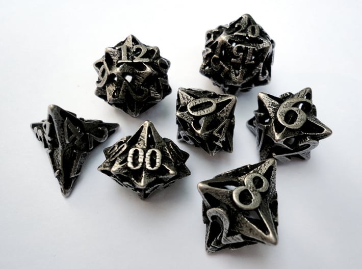 Pinwheel Dice Set with Decader 3d printed In stainless steel and inked.