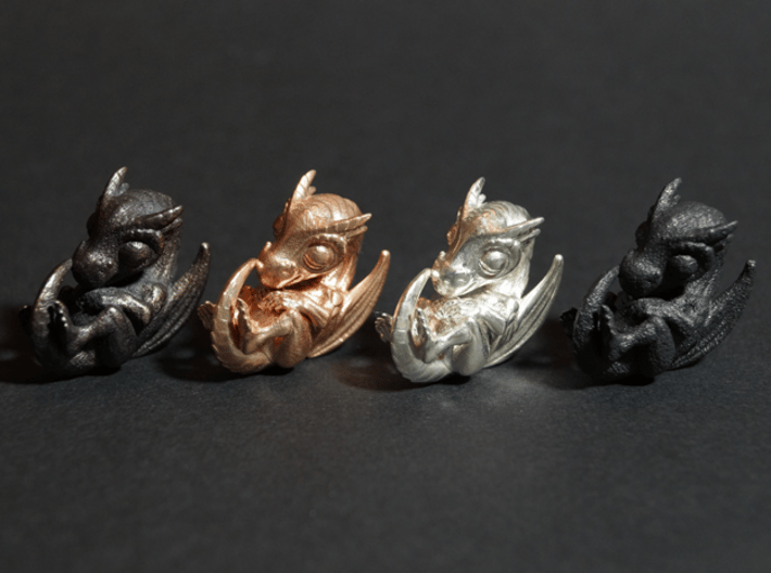 Dragon Baby Talisman 3d printed Polished Grey Steel, Raw Bronze, Polished Silver and Matte Black Steel