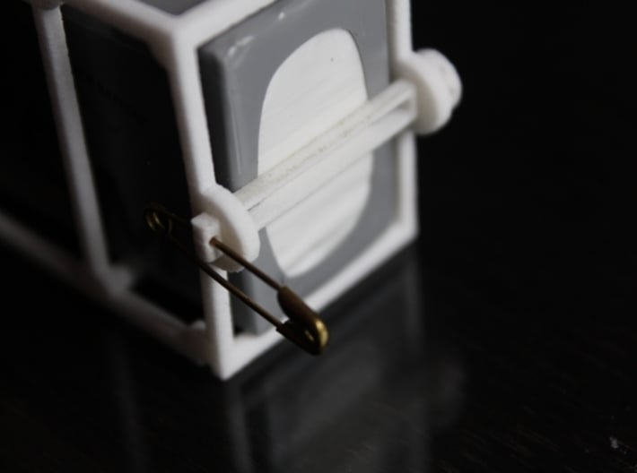 DJI Phantom - 3s Lipo Battery Cage - d3wey 3d printed Retaining pin slides over. Locked in place with a safety pin