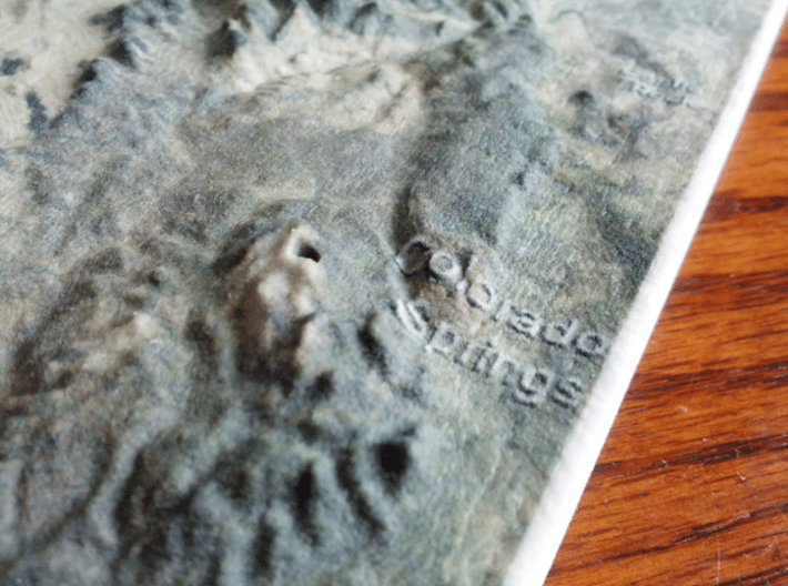 Colorado Fourteeners with holes, 12'' 3d printed Photo of actual model, focusing on Pikes Peak and Colorado Springs