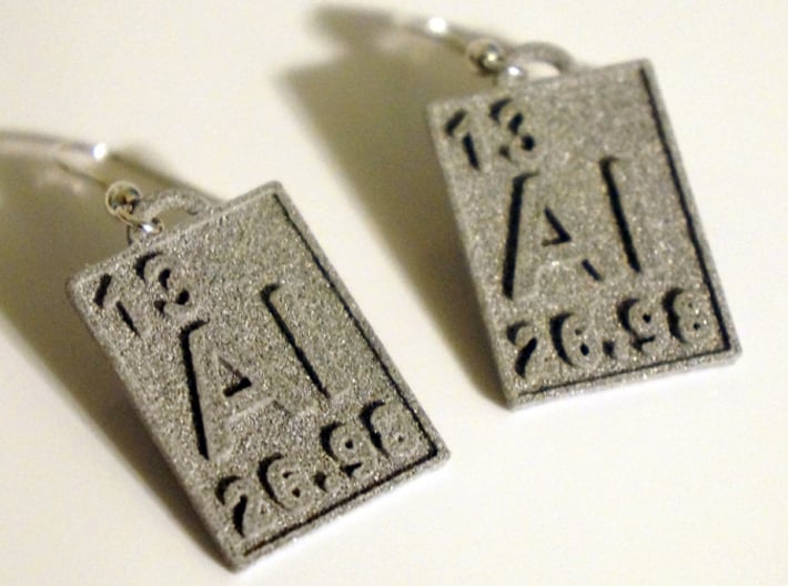 Aluminum Periodic Table Earrings 3d printed Photos of the earrings printed in Grey Plastic.