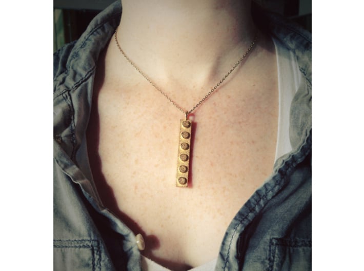 Lego-inspired Pendant Skinny 3d printed Shown here in Polished Gold Steel.