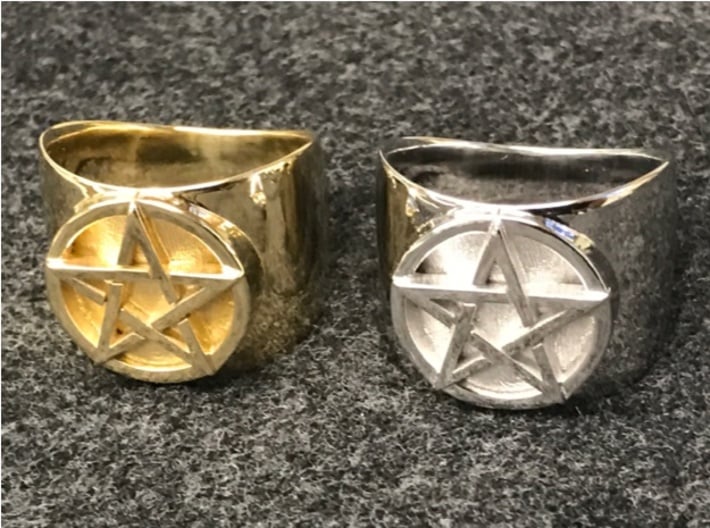 Pentacle Ring - large (choose size) 3d printed The ring in polished brass next to one in rhodium-plated brass. This is almost a "before and after" photo, since Shapeways first prints a polished brass model then applies the rhodium plating. 