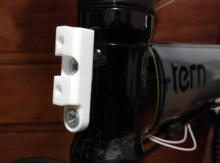 Brompton Carrier Adapter for Tern or Dahon Folders 3d printed After inserting the M5 nuts into their cavities, mount the adapter to the headtube. Then bolt the Brompton adapter on and you're good to go!