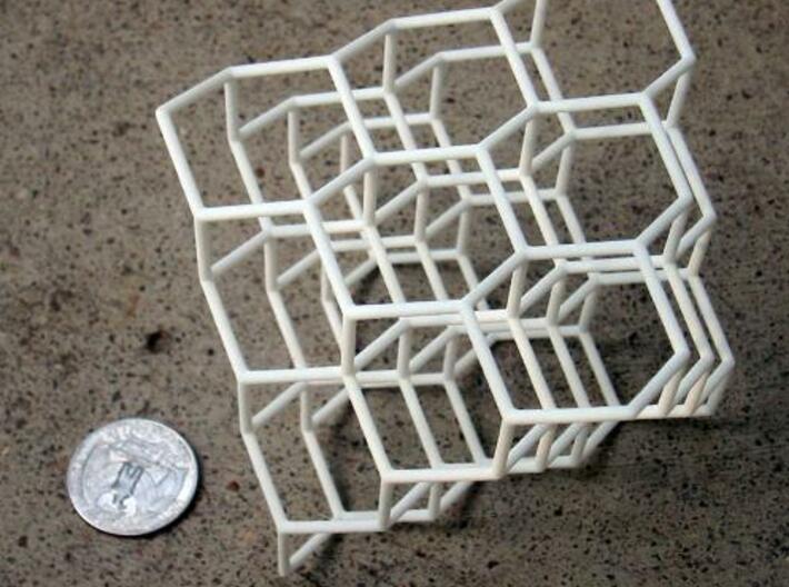 Diamond structure 3d printed Photograph with a US quarter coin for scale.