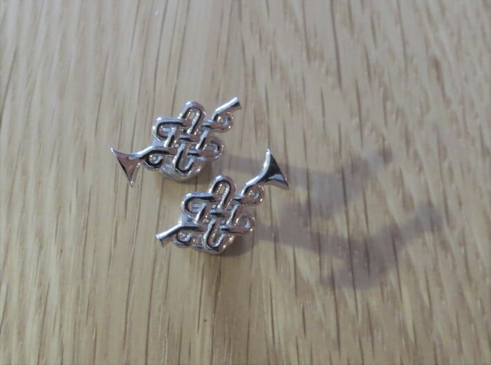 Infinity Knot Trumpet Cufflinks 3d printed Turns out a cool, light silver colour. 