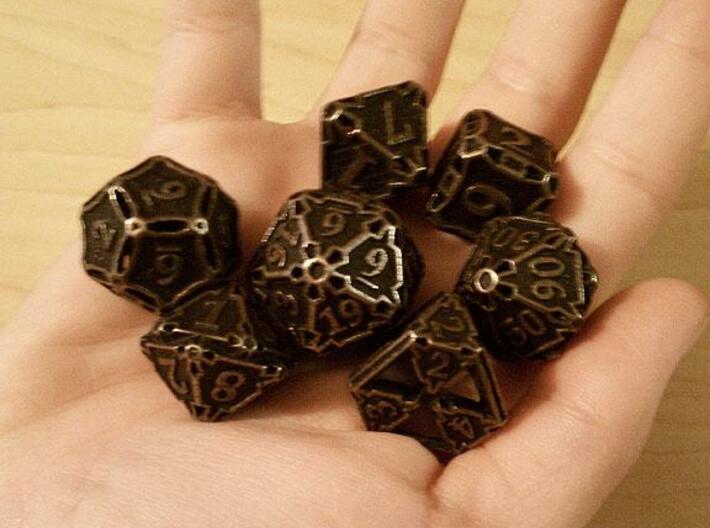 Large Premier Dice Set 3d printed In antique bronze glossy and inked.