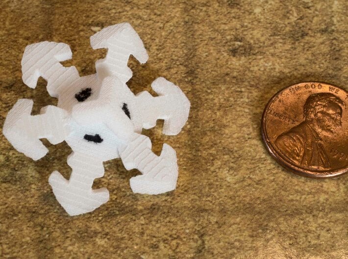 Snowflake D6 3d printed  Hand-inked.  Current version has the numbers enlarged for better legibility.