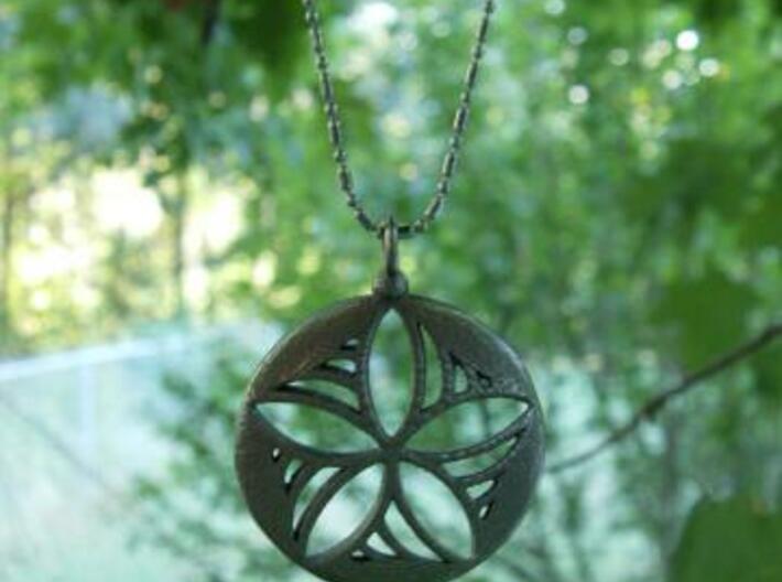 Star Pinwheel pendant 3d printed Stainless steel. Chain not included.