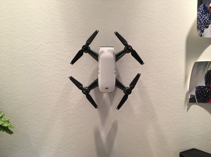 DJI Spark Wall Mount 3d printed DJI Spark on the wall