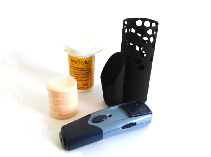 Test Strips, Lancet, and Glucose Organizer. 3d printed Organize your FreeStyle test strips, lancet device, and 4 glucose tablets.