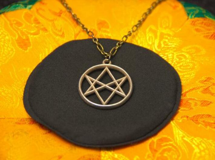 Unicursal Hexagram Pendant 3d printed Photo of Stainless Steel pendant on a chain.