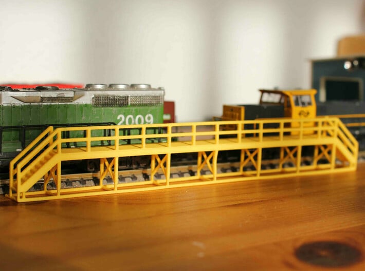 N Scale Train Maintenance Platform DOUBLE STAIRS 3d printed Train maintenance platform with two stairs in Yellow Strong & Flexible Polished, straight of the box.