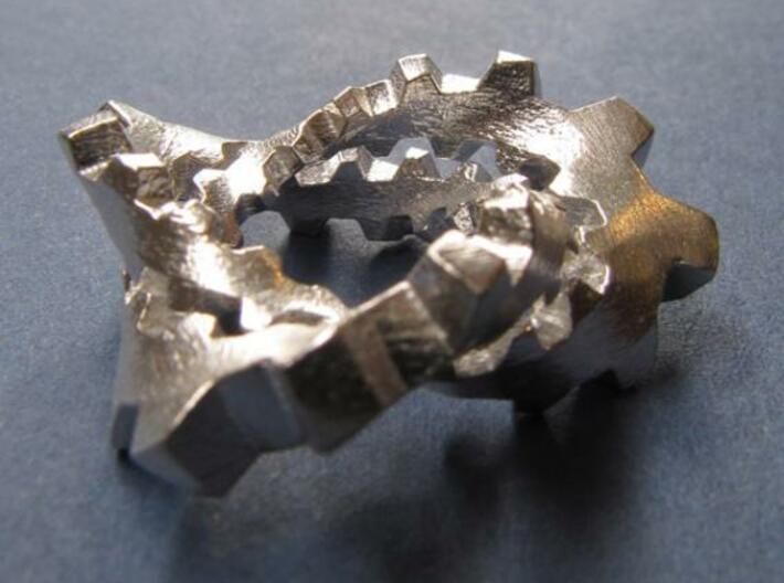 Knotted Cog (small) 3d printed In silver, from the side.