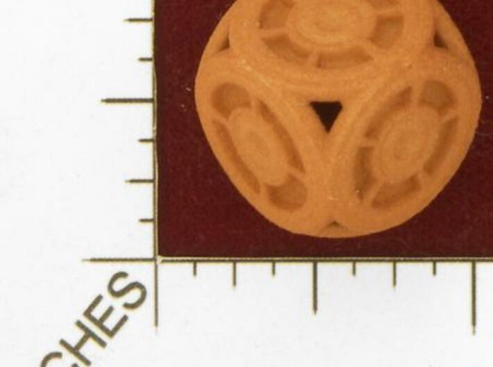 Circle Die 3d printed Photo by Kevin Cook of an early, unpolished, orange strong and flexible.