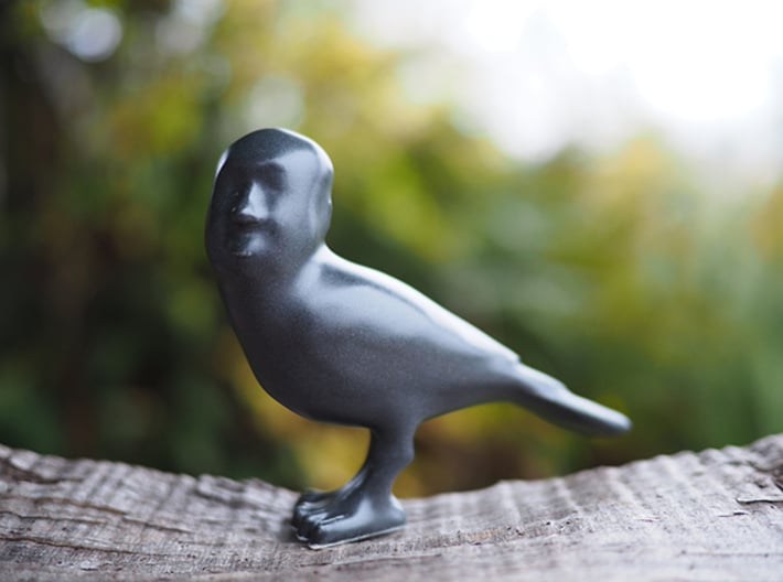 Alfred Hitchcrow 3d printed Matte Black Ceramic print. PLEASE NOTE: The detail is lost  due to the glazing & process of 3D-printing ceramic. Your ceramic print will look just like this photo.
