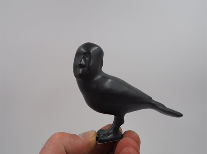 Alfred Hitchcrow 3d printed Matte Black Ceramic print. PLEASE NOTE:  The detail is lost due to the glazing & process of 3D-printing ceramic. Your ceramic print will look just like this photo.