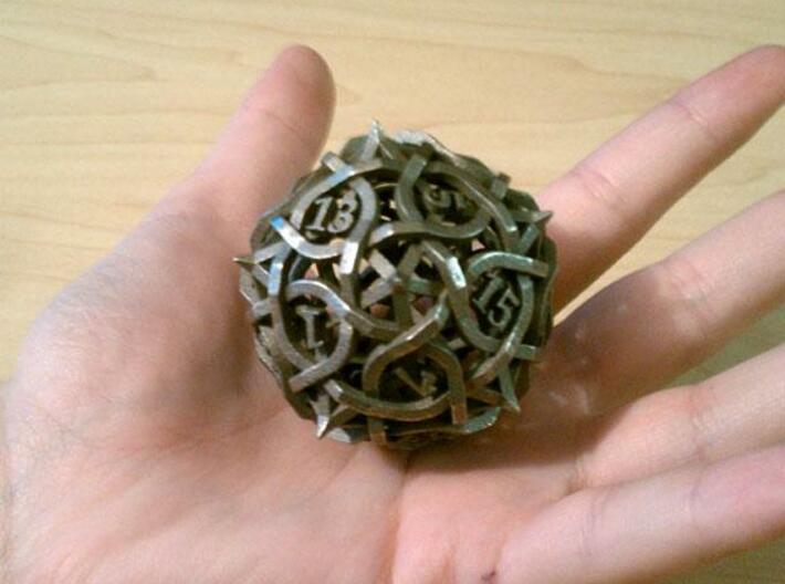 DoubleSize Thorn d20 3d printed In stainless steel.