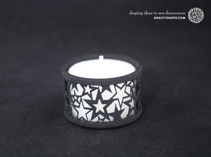 Small tealight holder with Stars  3d printed The photo shows a print made of black strong and flexible incl. silver lacing and a high 8h tealight candle.