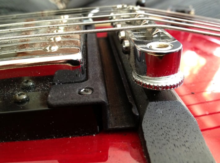Roland GK Pickup Mount - Quick Release Version 3d printed Base portion of assembly attached to bridge pickup ring using the same bolts that hold the pickup ring in place. I have tested on various guitars with Les Paul style bridges and verified the clearance.