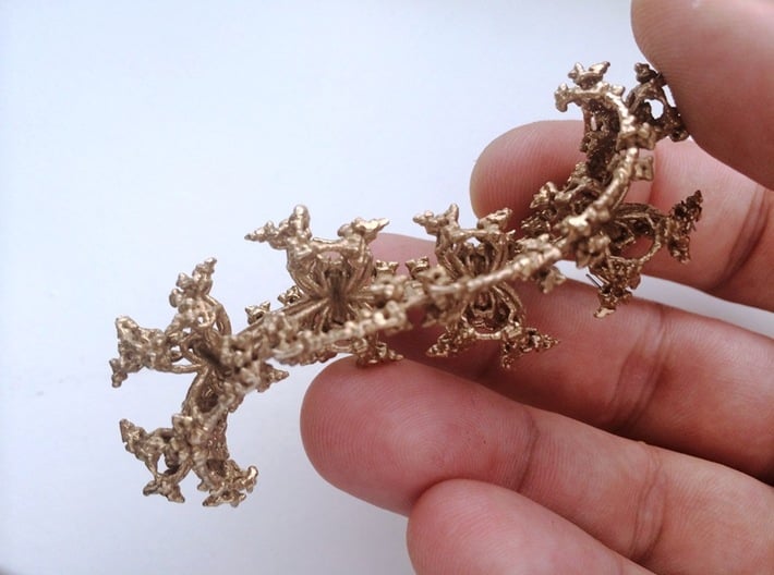 Kleinian Snake - small 3d printed Raw bronze