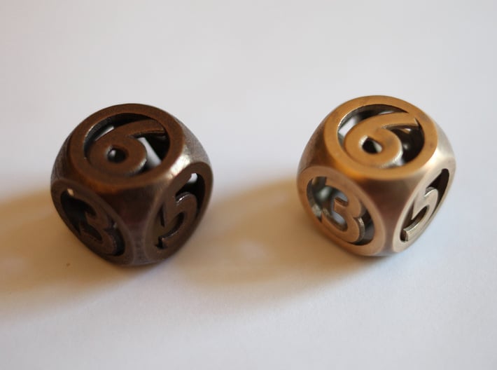 hollow round die 3d printed In polished bronze steel (left) and raw bronze (right)