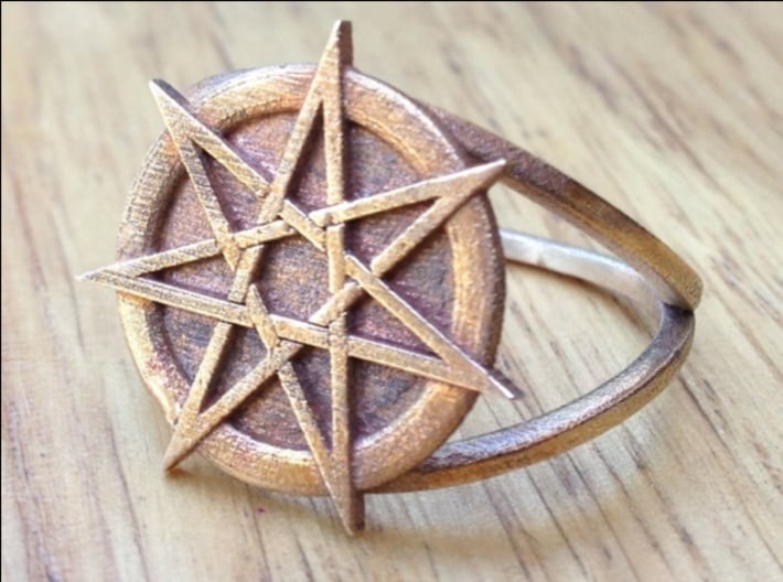 Fairy star ring (choose size)  3d printed The heptagram ring in raw bronze. This ring can only be printed in unpolished metals, due to the shape of the points on the star.