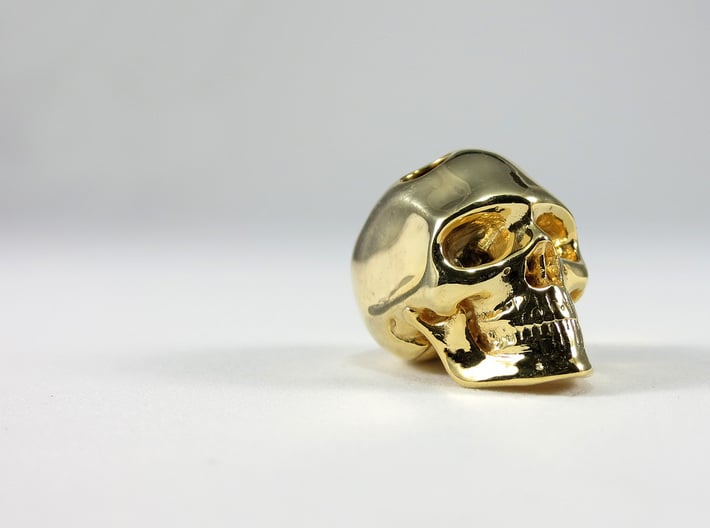 Realistic Human Skull (20mm H) - Pendant 3d printed 20mm H Pendant in Gold Plated Brass
