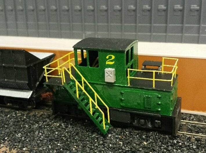 N-scale quench locomotive (LEFT-hand version) 3d printed Prototype being finished. Weathing, window glazing and couplers still missing. The prototype revealed fitment problems with the stairs which are fixed on the production model.