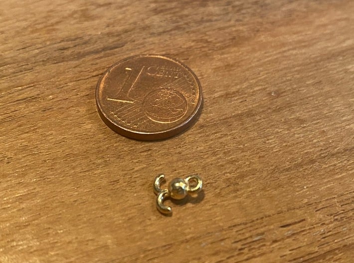 Hook with a weight for small cranes 3d printed hook (size comparison to Euro cent  coin)