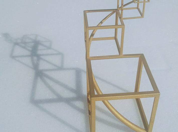 Golden Mean Spiral Cubes Flipped 3d printed Photo of White Plastic spray painted gold