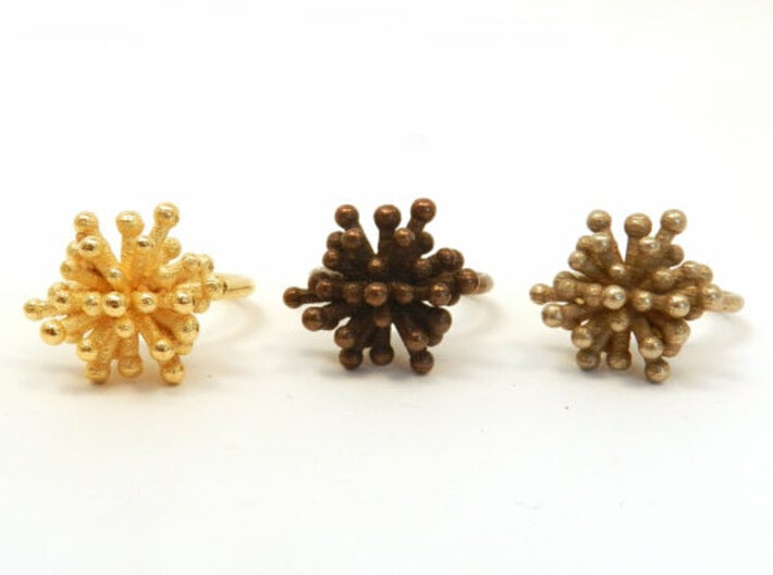 Single Starburst Ring 3d printed polished bronze steel, stainless steel, polished gold steel