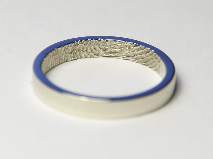 Fingerprint Ring - Hers 3d printed The &quot;hers&quot; 3mm fingerprint wedding ring, printed in beautiful 14k White Gold. Pictured ring is a US size 6 1/2 (16.92mm)