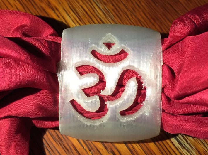 Om Link 3d printed Low quality proof made on my home printer, showing use with a silk.  Shapeways prints will be MUCH higher quality than seen here.