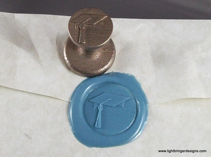 Mortarboard Wax Seal 3d printed Mortarboard Wax Seal and the impression in Light Blue sealing wax.