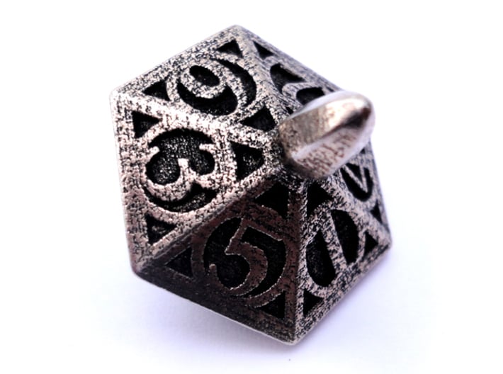 Top d6 3d printed In stainless steel and inked.