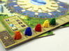 Ziggurat, Mayan Temple 3d printed Photo of 5 tokens on the Tzolk'in Game Board