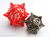 'Center Arc' dice, D20 MTG Spindown Life Counter 3d printed Stainless steel version next to a the larger version in red plastic