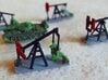 1/300 Oil Well Pumpjack 3d printed Handpainted models. Tank model shown for scale, not included in the 3d print