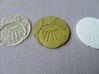 Estaban and Zia's Medallion from The Mysterious Ci 3d printed In "Transparent Detail", A painted one (is "Aluminide" underneath), and one in "White, Strong and Flexible" which is the recommended material for painting.